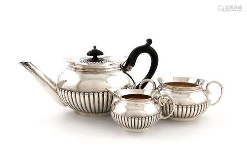 A matched three piece Victorian silver tea set, by…