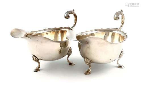 A pair of modern silver sauce boats, by J. B. Chat…