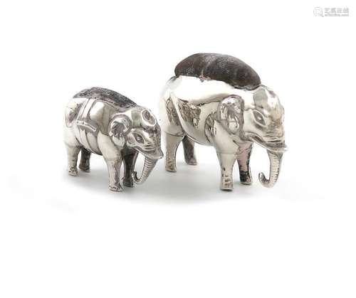 Two Edwardian novelty silver elephant pin cushions…