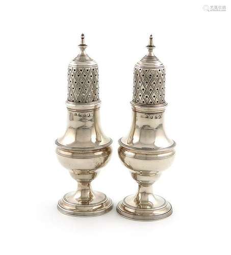 A pair of George III silver pepper pots, Crispin F…