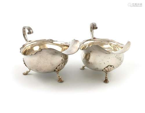 A pair of silver sauce boats, by Searle and Co, Lo…