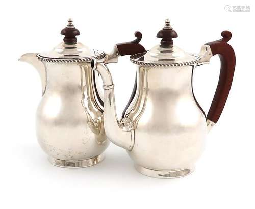 A pair of silver café au lait pots, by Mappin and …