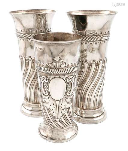 A pair of Victorian silver vases, by John Mappin, …