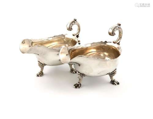 A pair of George IV silver sauce boats, by William…