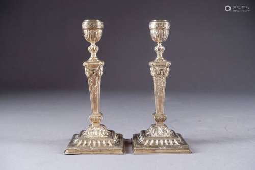 Pair of Louis XVI candlesticks. Square base and fl…