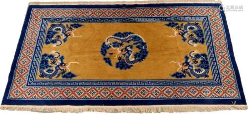 Peking rug. The ochre background shows dragons in …