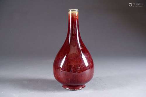 Bottle vase. With a thick red glaze, beef blood. C…