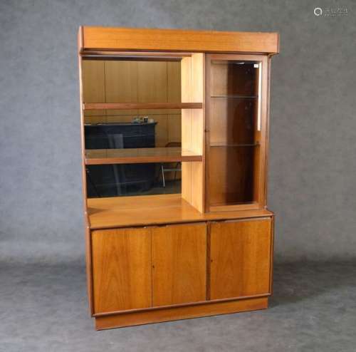 Vintage showcase. It has a double shelf with a mir…