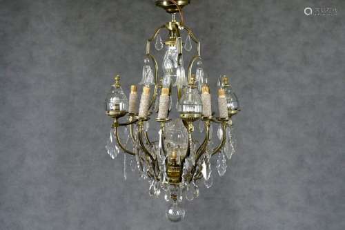 Louis XVIE Cage chandelier illuminated by a crown …