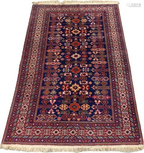 Perpetual Carpet. The blue background has florets …