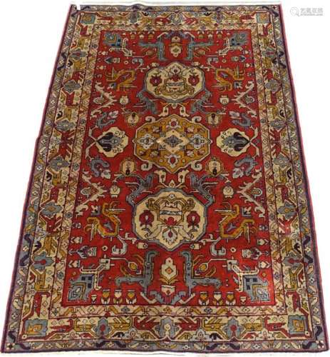 Caucasus rug. The red background has three medalli…