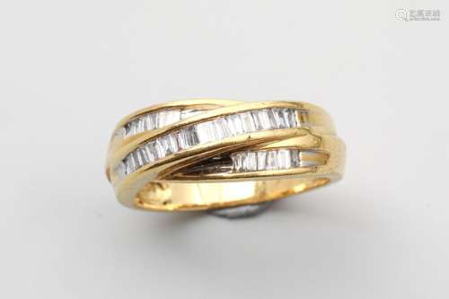 18k yellow gold ring composed of three intertwined…