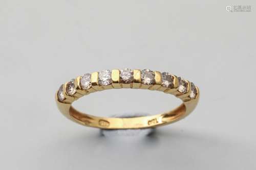 Half wedding band in 18k yellow gold with diamonds…