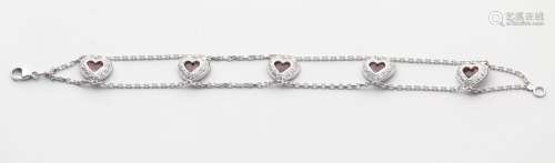 Bracelet in 18k white gold composed of two chains …