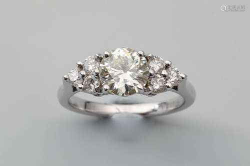 18k white gold ring set with a modern cut diamond …