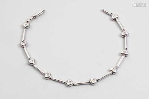 Articulated bracelet in 18k white gold with oblong…