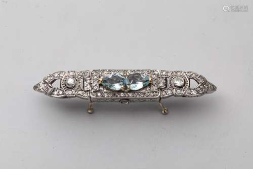 18k white gold brooch surmounted with diamonds and…
