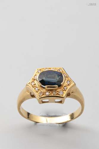 Hexagonal ring in 18k yellow gold surmounted by a …