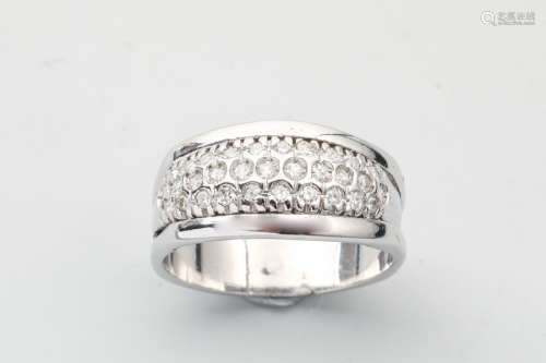 18k white gold band ring with a half ring set with…