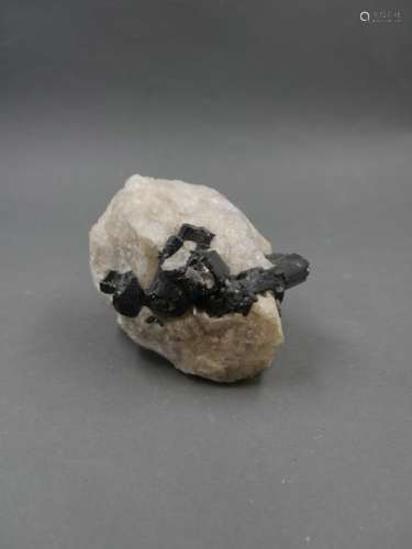 Black tourmaline in a quartz block,