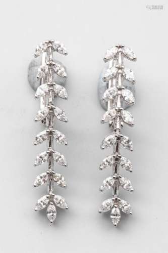 Pair of 18k white gold earrings with two branches …