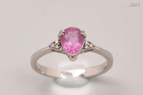 18k white gold ring set with a pear cut pink sapph…