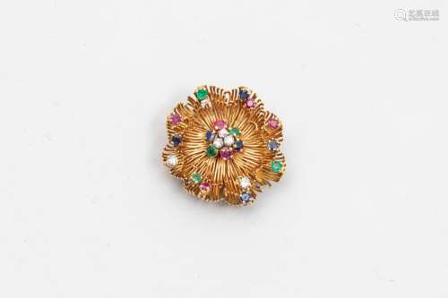 Flower brooch in 18k yellow gold surmounted by dia…