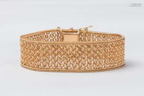 Flexible bracelet in 18k yellow gold with openwork…