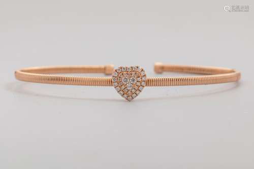 Semi rigid 18k rose gold bracelet with a heart pav…