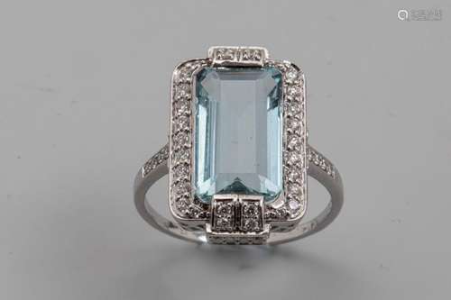 18k white gold ring set with an emerald cut aquama…