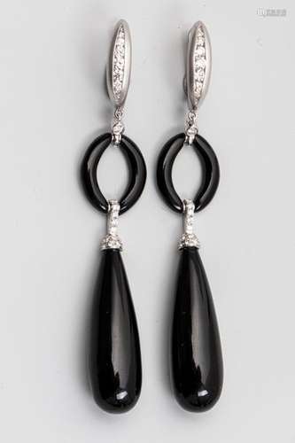 Pair of earrings in white gold with black drop opa…