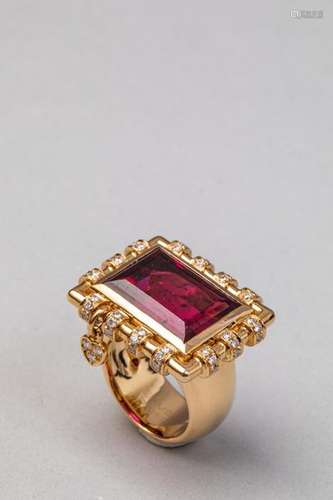 18k yellow gold ring set with a rubellite of about…