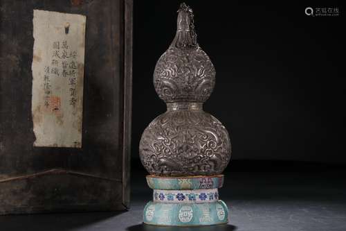 A Chinese Carved Silver Double Gourd Vase with Cloud and Dragon Pattern