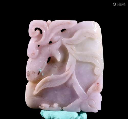 A Carved Jadeite Lotus Leaf Pendant