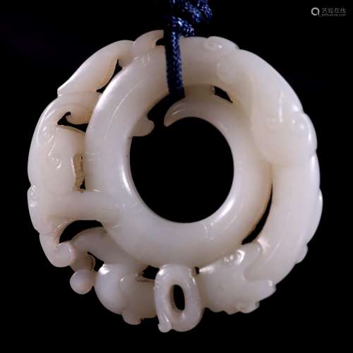 A Chinese Carved Jade Pendant Shaped in Dragon