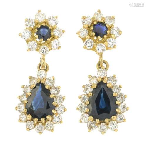 A pair of sapphire and diamond earrings.Estimated total