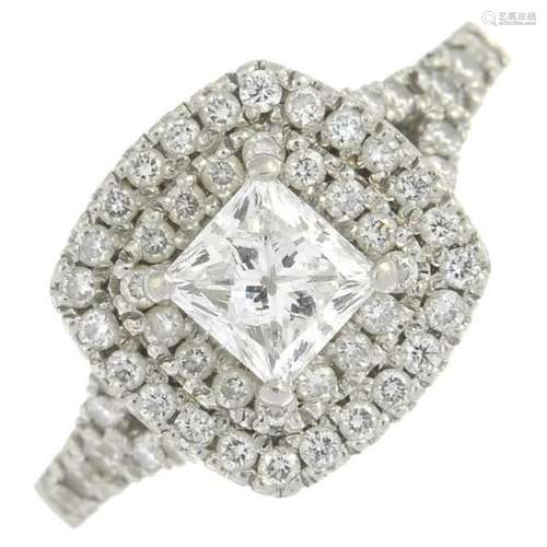 A platinum diamond cluster ring.Principal diamond with