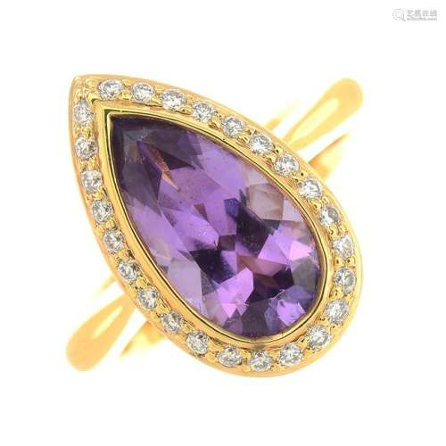 An amethyst and diamond dress ring.Amethyst calculated