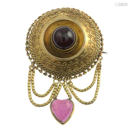 A mid to late Victorian gold garnet brooch.Length