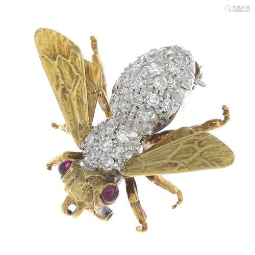 A diamond and ruby fly brooch.Estimated total diamond