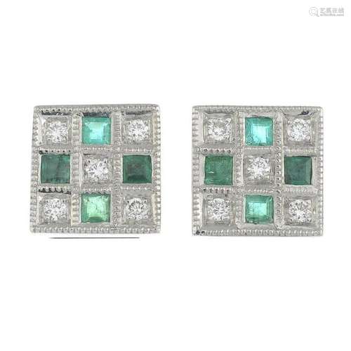 A pair of emerald and diamond cluster