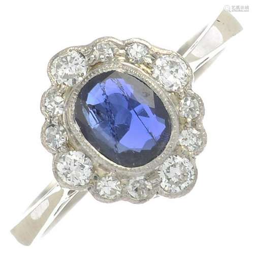 A sapphire and diamond cluster ring.Sapphire weight