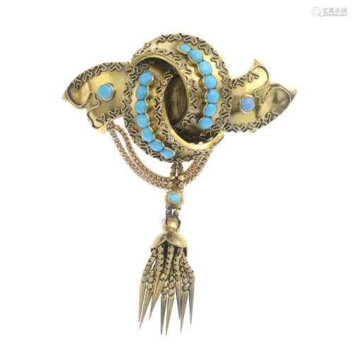 A mid Victorian gold turquoise brooch. Length 7cms.