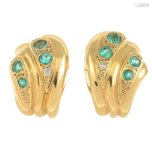 A pair of emerald and diamond earrings. Length 2.1cms.