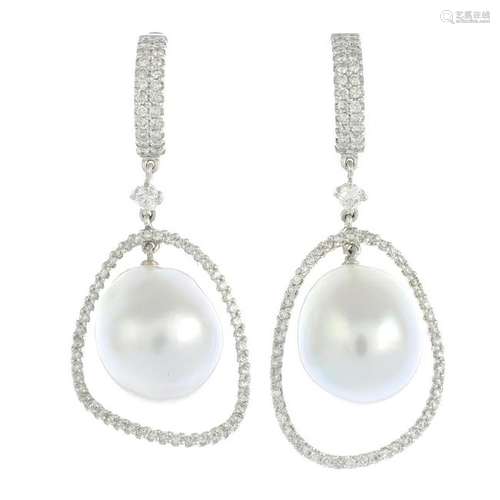 A pair of cultured pearl and diamond earrings.Estimated