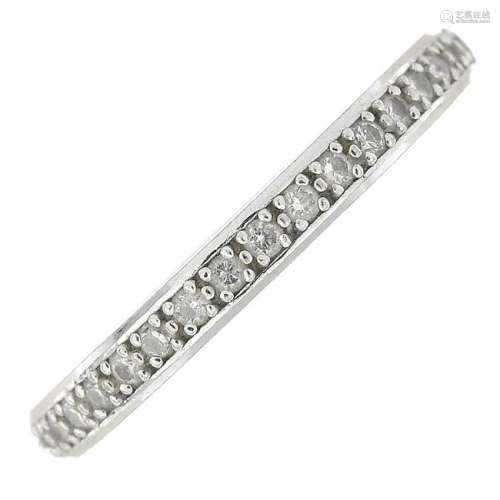 An 18ct gold diamond half eternity ring. Estimated