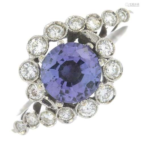 A tanzanite and diamond cluster ring.Calculated