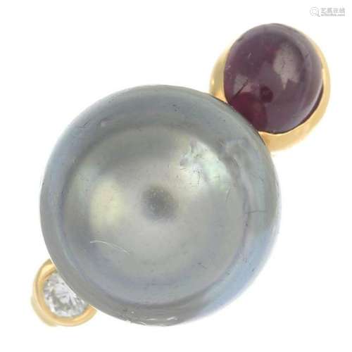 A cultured pearl, diamond and ruby ring.Diameter of