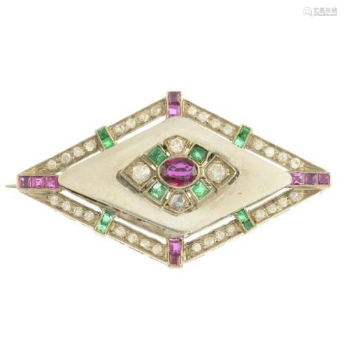 A diamond, emerald and ruby brooch. Estimated total
