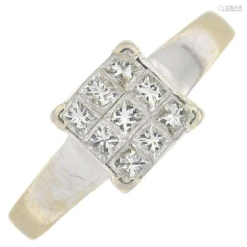 A square-shape diamond cluster ring.Estimated total